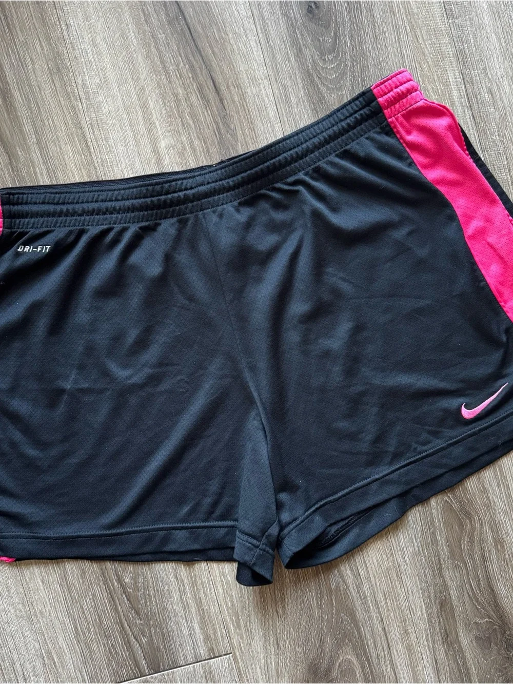 Nike Women's Black Shorts with Hot Pink Side Panels